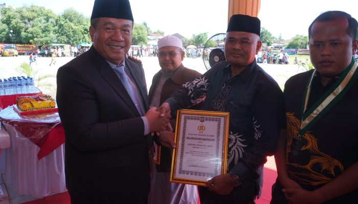 Bupati Asahan Taufik Zainal Abidin SSos MSi hadiri upacara peringatan HUT Bhayangkara ke 80 di Lapangan Adhi Pradana, Rabu (1/7).