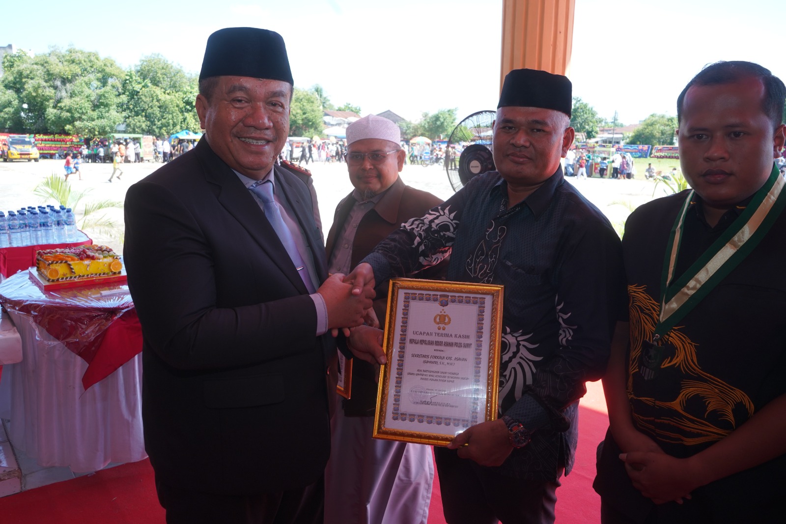 Bupati Asahan Taufik Zainal Abidin SSos MSi hadiri upacara peringatan HUT Bhayangkara ke 80 di Lapangan Adhi Pradana, Rabu (1/7).