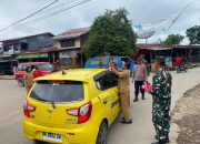 Polsek Barusjahe Bersama Forkopimcam Bagikan Bendera Merah Putih, Semarakkan HUT ke-81 Kemerdekaan RI